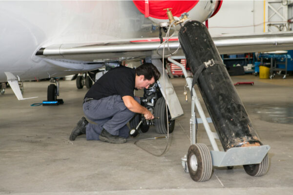 Maintenance Team Working on Wheel